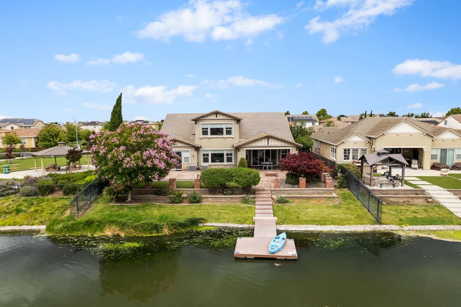 Waterfront home with a private dock on the water at 2683 Manresa Shore Lane, Oakley, California, listed by The Mashore Group